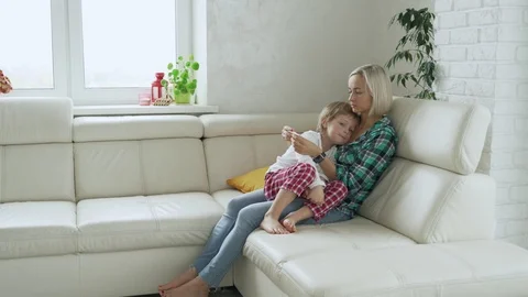 Mother measuring temperature of her ill kid at background. Sick child with high 스톡 동영상 97454058