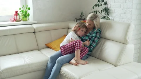Mother measuring temperature of her ill kid at background. Sick child with high Vídeo Stock 97458357