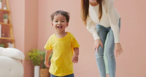 Mother playing with kid Stock Footage 225893368