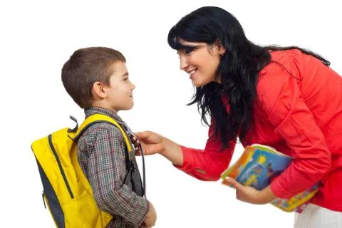 Mother preparing son for school Foto stock