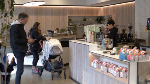 Mother pushing stroller at cafe Stock-Footage 118732028