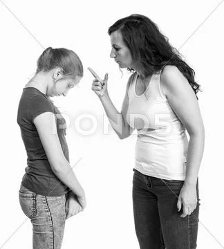 Mother shouting at her teenage daughter Stock Photos