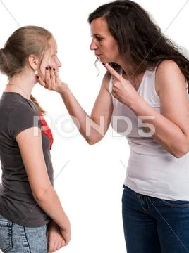 Mother shouting at her teenage daughter Stock Photos