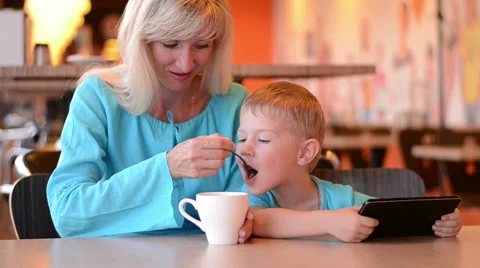 Mother with the son in cafe Stock Footage 62514511