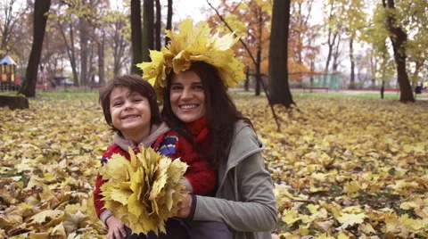Mother with son smiling to the camera, steadycam, slow motion shot at 240fps Stock-Footage 44923060