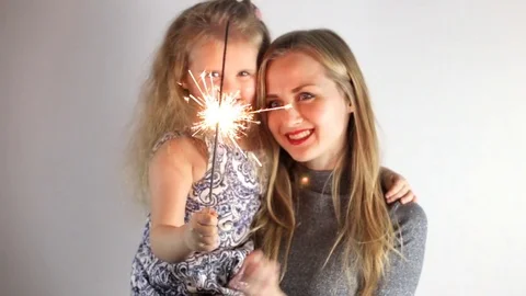 Mother with sparkler Stock Footage 70167028