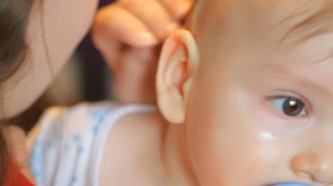 Mother stroking the child's head Stock Footage 49602819