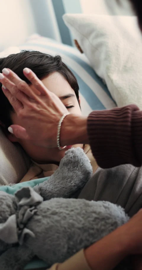 Mother, support and sick child in bedroom with comfort, conversation and monitor Stock Footage 339133351