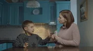 Mother Teaching Autistic Kid With Cards At Home. Kid With Autism Learning Stock Footage