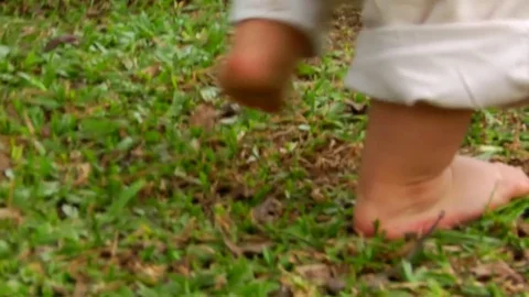 Mother teaching the baby the first steps Stock Footage 70089111