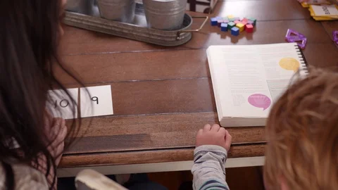 Mother Teaching Basic Counting To Her Little Son Stock-Footage 129500465