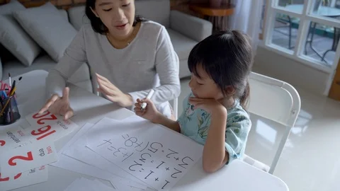 Mother teaching basic math to her little daughter 動画素材 117413838