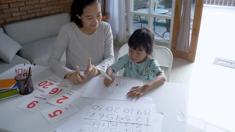 Mother teaching basic math to her little daughter 動画素材 117414735