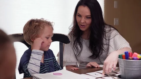 Mother Teaching Basic Math To Her Little Son Stock Footage 129500101