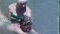 Mother Teaching Daughter to SWIM in Pool Girl 1950s Vintage Film Home Movie 5177 HD Footage