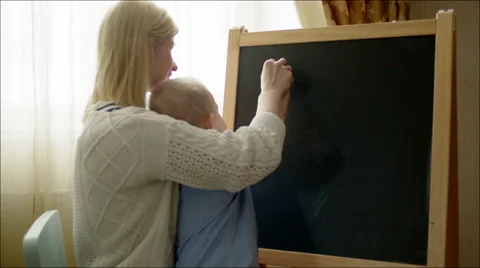 Mother Teaching Son Numbers Stock Footage 60404373