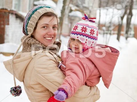 Mother with toddler in winter Stock Photos
