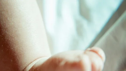 Mother touching baby's hand Video stock 94884247