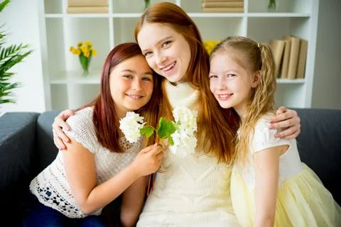 Mother with two daughters Stock Photos