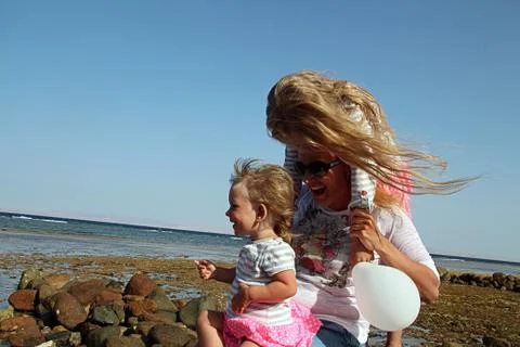 Mother with two daughters Stock Photos