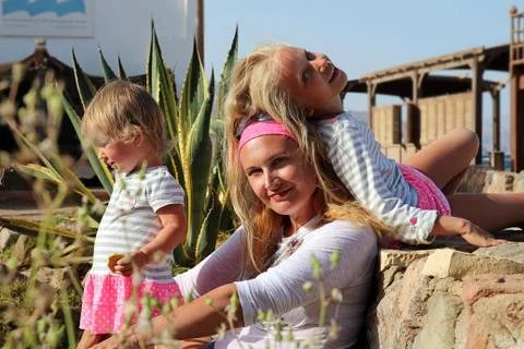 Mother with two daughters Stock Photos