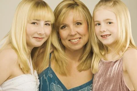 Mother With Two Daughters Stock Photos