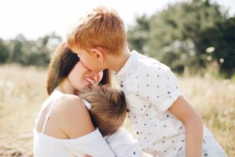 Mother with two sons Stock Photos