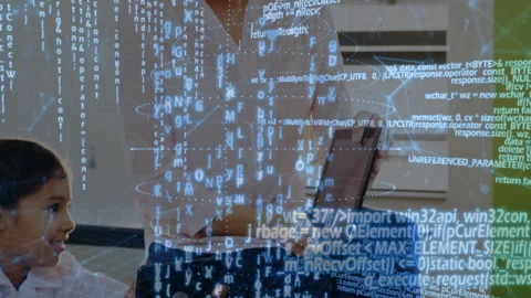 Mother typing on laptop revealing code as child raising VR headset for tech demo Stock Footage 312656164