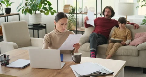 Mother working from home while father and son using digital tablet Stock Footage 145226285
