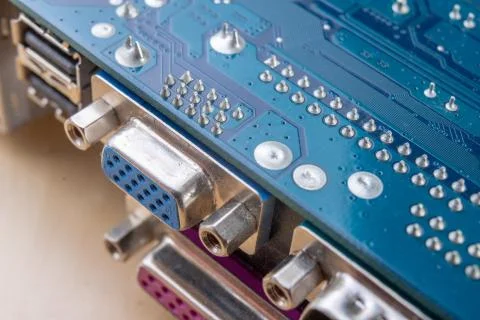 The motherboard and computer components. Computer accessories on a workshop t Stock Photos