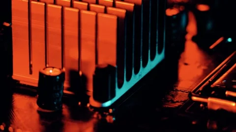 Motherboard close up, microchip, pc orange lighting Stock Footage 142375580