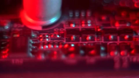Motherboard close up, microchip, pc red lighting Stock Footage 142375566