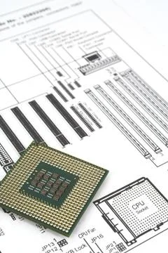 Motherboard instruction manual with diagram and cpu close-up Stock Photos