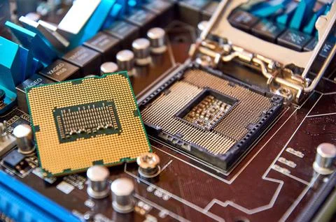 The motherboard processor is removed from above close up CPU closeup Foto stock