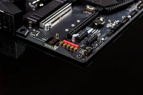 Motherboard on a table close-up, inside of a desktop computer showing chips Stock-Fotos