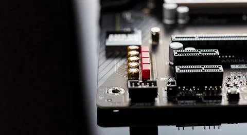 Motherboard on a table close-up, inside of a desktop computer showing chips 写真素材