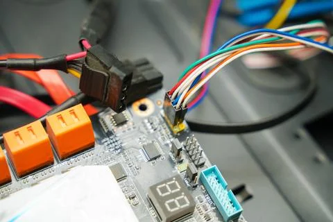 Motherboard with wires and post code close up computer background 写真素材