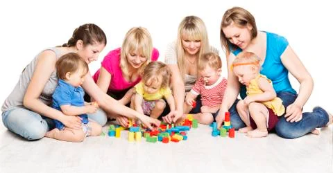 Mothers and Kids Group Playing Toys, Mother With Baby Play Building Blocks Stock Photos