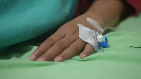 A mother's hand with an IV inserted. Stock-Footage 292951795