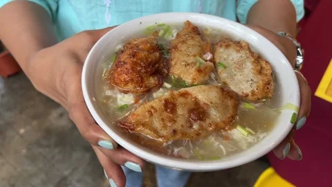 Mothuk, a type of momo soup prepared in Darjeeling style in Kolkata Stock Footage 313715359