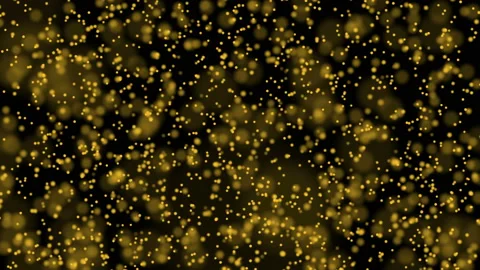 Motion abstract graphic of particles gold dust float in the air on black Stock Footage 133904230