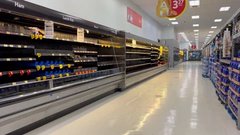 The motion of almost empty ham shelf inside Walmart store Stock Footage 165871232