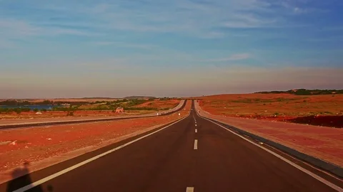 Motion along Asphalt Road to Infinity am... | Stock Video | Pond5