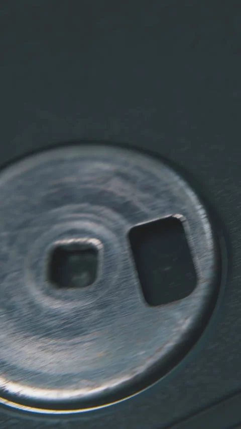 Motion along diskette in plastic case on white background Video stock 317385518