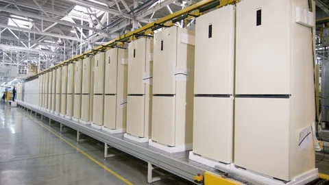 Motion along row of refrigerator cases on conveyor in shop Stock Footage 106224619