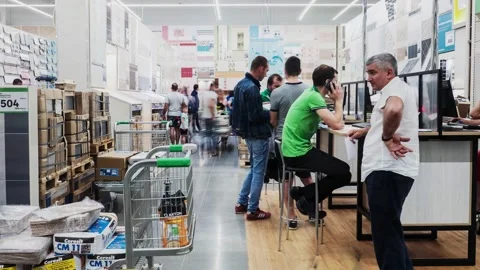 Motion along spacious hall with goods customers and sellers Stock Footage 135422236