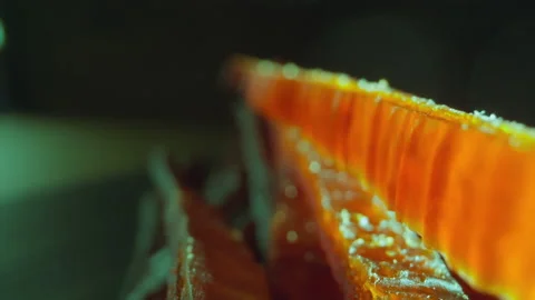 Motion along stack of salted chum salmon fish strips 스톡 동영상 165821936