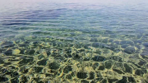 Motion and Top View of Clear Ocean Water Reflecting. Stock Footage 227338815
