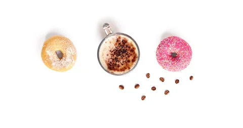 Motion animation with coffee, donuts and coffee beans on a white background. Stock Footage 133853682