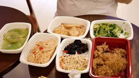 Motion of appetizers and vegetable on table at food court area Video stock 82446973